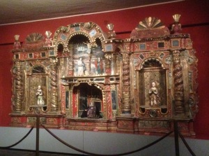 An alter piece at the entrance of the second floor, which has all the work brought over from the Spanish. Some of this work combined ancient South American images with European images.